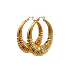 Lightweight Textured Hoop Earrings in 10k Yellow Gold Enhance your look with these modern decorative hoop earrings crafted from lightweight, hollow 10 karat yellow gold. The polished finish gives a brilliant shine, while the intricate gold detailing adds a stylish flair. Perfect for any outfit, from casual daywear to evening attire, these hoops are designed for both comfort and elegance. Their lightweight design ensures they are easy to wear all day. Add these detailed hoops to your jewelry collection for a blend of sophistication and everyday wearability. CHARACTERISTICS Measurements: 1.75 inches in length Era: Modern Composition: 10 Karat Yellow Gold Total Gram Weight: 7.3 g Inscription: 10kt -- ALL PIECES ARE SUBJECT TO PRIOR SALE DUE TO HAVING A RETAIL LOCATION. -- 30-DAY RETURN POLICY Luxury Hoop Earrings With Ear Wire, Modern Gold Crescent Hoop Earrings, Modern Crescent Yellow Gold Hoop Earrings, Modern Hallmarked Hoop Earrings, Yellow Gold Crescent Hoop Earrings, Platinum Rose Gold, Sapphire Solitaire, Earring Crafts, Shop Engagement Rings