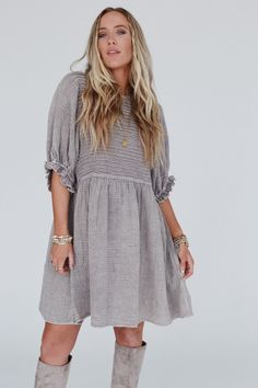 So cute and comfy, you’re going to want to twirl and dance in the Quinn Puff Sleeve Mini Dress because of how confident you feel in it! This dress will have you feeling effortlessly boho-chic all day long because it features: Comfortable textured mineral washed fabric Relaxed and loose babydoll silhouette with mini dress length So cute pintuck detailing along the bodice Classic rounded neckline Elbow length sleeves with cute gathered ruffled bottom edges So cute boho outfit pair with: Tattoo Bra Spring Daywear Dresses With Bubble Hem, Spring Dresses With Bubble Hem For Daywear, Spring Bubble Hem Dresses For Daywear, Cute Knee-length Flowy Dress, Relaxed Fit Ruffled Dress For Day Out, Relaxed Fit Dress With Ruffles For Day Out, Relaxed Fit Ruffle Dress For Day Out, Spring Billowy Dresses With Bubble Hem, Spring Dresses With Gathered Sleeves And Bubble Hem