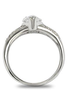 - Sterling silver white marquise cut CZ center gemstone with round CZ accents ring . Approx. 15mm L x 18mm W ring face. Imported Sterling silver, cubic zirconia Modern Solitaire Cubic Zirconia Rings, Modern Cubic Zirconia Ring With Prong Setting, Modern Cubic Zirconia Rings With Diamond Accents, Modern Crystal Ring With Cubic Zirconia, Modern White Topaz Rings With Diamond Accents, Modern Cubic Zirconia Ring In Diamond White, Modern Diamond White Cubic Zirconia Wedding Jewelry, Modern Jewelry With Marquise Cut Center Stone, Modern Diamond White Cubic Zirconia Ring