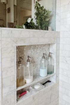 the bathroom is clean and ready to be used as a storage area for personal care items