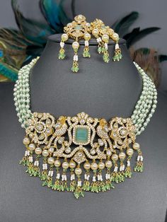 Beautiful Jewelry sure to elevate any look! Feel free to contact me if you have any questions about this item. Handmade Green Bridal Necklace For Wedding, Green Beaded Bridal Necklace Gift, Green Beaded Bridal Necklace, Elegant Green Beaded Kundan Necklace, Green Beaded Jewelry Sets For Party, Green Jeweled Kundan Necklace For Party, Green Jeweled Wedding Jewelry, Green Beaded Kundan Necklace For Party, Elegant Green Beaded Bridal Necklace