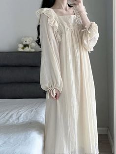 This elegant Coquette Lace Nightgown is crafted from a luxurious blend of fabrics for a comfortable and stylish fit. The all-over lace pattern is subtly sheer for a delicate and feminine look. Its adjustable straps, buttons, and drawstring waist make it the perfect nightgown for a perfect night’s sleep. Lace Sleeping Gown, Nightgown Drawing Reference, Victorian Pajamas Nightgowns, 1700s Nightgown, Royal Sleeping Gown, Victorian Era Nightgown, Korean Night Gown, 18th Century Nightgown, Long Nightgowns For Women