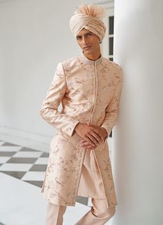 Pastel Pink hand embroidered sherwani made in finest silk embellished with elegant resham, zardosi and pearl work. Teamed with matching safa, pants, kurta and an embroidered stole Composition: Raw Silk Care: Dry Clean Only and Vacuum Storage This product can be customized for colour, sleeves, length and neck design Check Size Guide or choose MySize for free customisationDelivery: 4-6 weeks as the product is hand crafted.For more information and sizes please contact fabiliciousfashion@gmail.com o Pink Sherwani, Love Pastel, Embroidered Sherwani, Resham Embroidery, Vacuum Storage, Embroidered Border, Indian Man, Beaded Neckline, Fashion App