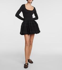 Find ALAÏA Alaïa Crinoline Wool-blend Minidress on Editorialist. Material: 81% wool, 12% polypropylene, 7% polyamide. Care instructions: dry clean. Made in Italy. Designer color name: Noir Alaia. Material II: 92% wool, 6% polyamide, 2% polyurethane. Party Dress With Voluminous Skirt For Fall, Chic Fall Dress With Voluminous Skirt, Spring Evening Wool Dresses, Elegant Spring Wool Dress, Black Wool Evening Dress, Black Wool Dress For Evening, Black Fitted Wool Dress, Fitted Black Wool Dress, Designer Fitted Winter Dress