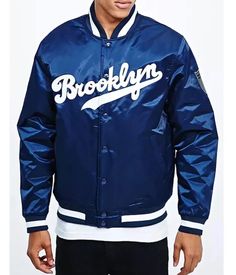 Blue Varsity Jacket For Streetwear, Blue College Track Jacket With Pockets, Blue Varsity Jacket With Button Closure For Streetwear, Blue Track Jacket With Pockets For College, Urban Navy Outerwear For Streetwear, Blue Sporty Outerwear With Ribbed Cuffs, Sporty Blue Outerwear With Ribbed Cuffs, Urban Blue Outerwear For Streetwear, Urban Blue Long Sleeve Outerwear