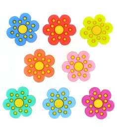 six different colored flowers with dots on them