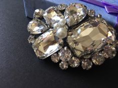 "Simple oval shaped clear rhinestone crystals brooch pin. We have embellished with pretty pearls on top. Perfect for all bridal wear!! Color: silver with clear rhinestone crystals and pearls Size: measures around 2.25\" long x 1.5\" width Item ship out in a gift box with tracking number to you (around 10 to 14 business days for delivery). We also provide fast shipping service, around 3-4 business days delivery but need to add extra charge. Please convo us if need." Wedding Jewelry Bridesmaids, Brooch Wedding, Wedding Brooch, Etsy Wedding Dress, Crystal Accessories, Crystal Brooch, Bridal Bracelet, Pearl Brooch, Rhinestone Brooches