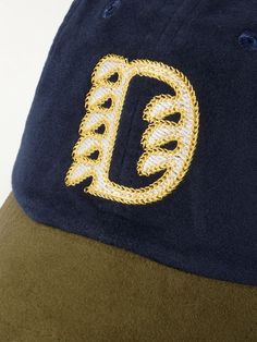 Drake's' baseball cap reads autumnal with its thermal cotton-flannel. It's panelled in an easy-to-coordinate navy and olive with a logo embroidered at the front. Winter Cotton Six-panel Baseball Cap, Winter Six-panel Cotton Baseball Cap, Navy Six-panel Baseball Cap With Logo Patch, Navy Baseball Cap With Embroidered Logo For Baseball Season, Navy Embroidered Logo Baseball Cap For Baseball Season, Navy Baseball Cap With Embroidered Logo, Navy Dad Hat With Embroidered Logo, Winter Six-panel Baseball Cap For Streetwear, Winter Baseball Cap With Embroidered Logo And Curved Brim