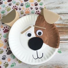 a paper plate with a dog's face on it