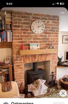 an old brick fireplace with a clock above it