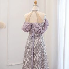 Indulge in luxury with the Dreamy Vow Sparkly Sequin Off Shoulder Purple Evening Dress. Designed with elegant crystal accents, this formal dress exudes sophistication and style. Perfect for weddings and special occasions, make a statement in the SS507 dress and turn heads wherever you go. window.adminAccountId=244214477;