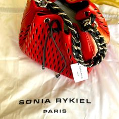 Brand New Sonia Rykiel Bicket Bag- Red Designer Red Pouch Shoulder Bag, Designer Red Rectangular Bucket Bag, Luxury Red Bucket Bag For Travel, Luxury Red Top Handle Bucket Bag, Luxury Red Pouch Bucket Bag, Red Luxury Bucket Bag With Detachable Handle, Luxury Red Bucket Bag With Detachable Strap, Luxury Red Bucket Bag With Detachable Handle, Designer Red Bucket Bag With Removable Pouch