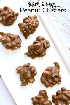 chocolate peanut clusters on a white plate with the words quick and easy peanut clusters in the middle