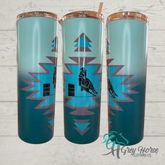 three blue tumblers sitting next to each other