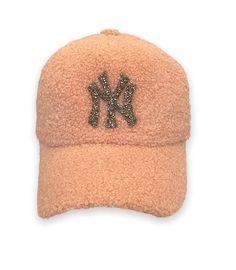 Description: Cozy, textured fuzzy material with a bold rhinestone "NY" logo Classic baseball cap design adds a stylish touch to any outfit Adjustable strap for a comfortable and secure fit Material & Care: Made from soft, durable fabric with rhinestone detailing Spot clean only to preserve the rhinestones and fabric Fuzzy Baseball Cap Outfit, Trendy Baseball Cap For Baseball Season, Trendy Winter Dad Hat, Trendy Winter Streetwear Baseball Cap, Trendy Winter Snapback Hat For Streetwear, Trendy Winter Dad Hat, One Size, Trendy One Size Fits Most Baseball Cap, Trendy Winter Snapback Hat, Trendy Curved Brim Dad Hat For Winter