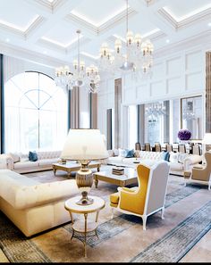 an elegant living room with chandelier, couches and chairs in it's center