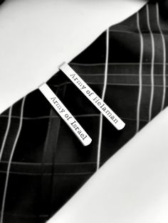 "This CUSTOM missionary tie clip makes such a nice gift for a baptism, confirmation, or mission call, birthday, or a new missionary. Would also be great as a seminary graduation gift and priesthood ordination gift! You can choose from the following phrases: - Army of Helaman OR - The Lord's Battalion OR - Army of Israel OR - Call to Serve OR - Choose your own phrase Our tie bars are hand stamped on high-quality, lightweight aluminum and present beautifully as a gift. We offer two sizes: Approxim Seminary Graduation, Boy Baptism Gift, Missionary Care Packages, Personalized Tie Clip, Mission Call, Baptism Gifts For Boys, Lds Mission, Missionary Gifts, Preppy Gifts