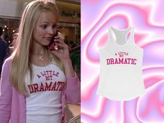 High Quality "A Little Bit Dramatic" Y2K Tank Top. The Devil Wears Prada? No... The Devils Wears Cute Y2K Tanks 💅💅  ⭐️ 100% Cotton  ⭐️ Extremely light and comfortable fabric  ⭐️ Runs true to size, refer to size chart --IMPORTANT-- ⭐️ PLEASE CONTACT ME IF THERE IS AN ISSUE WITH YOUR ORDER BEFORE LEAVING A NEGATIVE REVIEW. We strive for 100% customer satisfaction, so please to not hesitate to reach out! ⭐️ We do NOT accept cancellations, returns or exchanges since all items are made to order. Please ensure that sizing/color/shipping address are all correct before placing an order.  ⭐️ Final product may slightly vary in color and placement as mock-ups are used solely for demonstration purposes. Pink Pop Culture Tops For Spring, Spring Pink Pop Culture Tops, A Little Bit Dramatic, Crop Top Y2k, Baby Crop Top, Regina George, Y2k Baby Tee, Shirt Y2k, Baby T Shirts