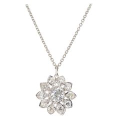 Handmade diamond platinum flower pendant on a 16 Inch platinum chain. 1 old European cut diamond L SI approx. .78cts 10 round diamonds J-K SI 2, approx. .80cts Platinum 6.3 grams Top to Bottom: 16.98mm or 11/16 Inches Width: 16.5mm or 10/16 Inches Depth or Thickness: 5.0mm Chain: 16 Inches Total length: 16.75 Antique Earrings Vintage, Antique Sapphire Rings, Diamond Rings Vintage, Vintage Antique Wedding, Vintage Wedding Bands, Vintage Antique Engagement Rings, Wedding Bands Vintage, White Gold Cross Pendant, Edwardian Engagement Ring