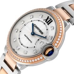 Cartier Ballon Bleu Steel Rose Gold Diamond Ladies Watch W3BB0004. Automatic self-winding movement. Round stainless steel and 18k rose gold case 36 mm in diameter. Fluted crown set with a blue spinel cabochon. 18k rose gold bezel set with original Cartier factory diamonds. Scratch resistant sapphire crystal. Silvered guilloche dial with original Cartier factory diamond hour markers. Blued steel sword-shaped hands. Stainless steel and 18k rose gold bracelet with hidden butterfly clasp. Fits 7" wr Automatic Round Diamond Watch For Anniversary, Anniversary Rose Gold Diamond Watch, Rose Gold Diamond Watch With Subdials For Anniversary, Rose Gold Diamond Watch With Round Dial For Anniversary, Rose Gold Round Watches For Anniversary, Timeless White Gold Watch With Rotating Bezel, Rose Gold Diamond Watch With Round Face, Timeless White Gold Diamond Watch With Rotating Bezel, Anniversary Rose Gold Watch Accessories With Chronometer