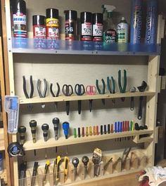 there are many different tools on the shelves