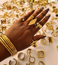 Our stylish brass rings are made with love and care. Details: 》Our rings are 100% handmade using brass.  》Listing is for 10, 20 or 50 rings. **BUY MULTIPLE ITEMS AND PAY SHIPPING FOR ONE ITEM ONLY. THE REST ARE SHIPPED FREE** All items are shipped through DHL express!! Gold Brass Midi Rings As Gift, Matte Gold Brass Rings As Gifts, Gold Brass Stackable Rings For Gift, Handmade Gold-plated Midi Rings, Unique Handmade Gold Stackable Rings, Handmade Adjustable Gold Stackable Rings, Handmade Gold Stackable Rings, Matte Gold Brass Rings For Gift, Unique Gold Brass Rings