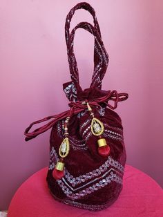 Maroon Indian/Nepali potli bag, handmade in Nepal, rich velvet material with embroidery, bridal bag, ethnic bridal bag, nepali bride, Indian bride Red Bag With Zari Work For Festivals, Velvet Pouch Bag As Gift, Velvet Pouch Bag For Gifts, Red Festive Bag With Zari Work, Velvet Pouch Bag For Gift, Velvet Bags For Festivals And Gifts, Red Bags With Zari Work For Diwali, Festive Red Bags With Zari Work, Traditional Red Shoulder Bag For Wedding