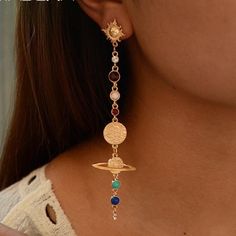 Solar System Earring Earring ($1650) Sofia Zakia, Shoulder Duster Earrings, Jewelry Product Shots, Solar System Planets, French Hook Earrings, Gold Sun, Star Sapphire, Our Solar System, Single Earring