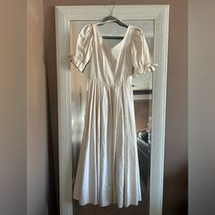 Vintage 1980s/90s Laura Ashley Wedding Dress, Made In Great Britain. The Dress Features Puff Sleeves With Bows, Buttons Up The Back And A Side Zipper. The Fabric Has A Beautiful Brocade Pattern With A Slight Sheen In An Off White Color. This Dress Is In Like New Condition. It Pains Me To Sell It, But Unfortunately It Does Not Fit Me. The Tag Says Size 4 But Because It’s Vintage Sizing It Definitely Runs A Bit Smaller (I’ve Included Pictures With Measurements). Elegant Vintage Puff Sleeve Wedding Dress, Spring Vintage Wedding Dress With Puff Sleeves, Spring Wedding Vintage Dress With Puff Sleeves, Vintage Puff Sleeve Dress For Wedding, Laura Ashley Wedding, Laura Ashley Wedding Dress, Laura Ashley Dresses, Ashley White, Brocade Pattern