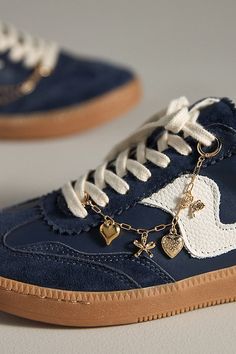 Charming new-trend alert: jewelry for your shoes. This set features icons that are nothing short of iconic. | Icon Chain Shoe Charm Set by Anthropologie in Gold, Metal Charms On Shoe Laces, Shoe Accessories Jewelry, Charms On Shoes, Shoes With Charms, Thrift Shoes, Shoes For Christmas, Shoe Lace Charms, Sneaker Charms, Bedazzled Stuff