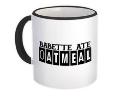 a white and black coffee mug with the words babette ate oatmeal on it