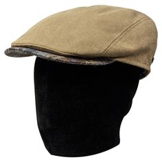 Saint Martin – "Frozen" Water Repellent Canvas Flat Cap Don't trade style for comfort in the cold and rain. Both fashionable and functional, this Saint Martin flat cap is made of water repellent cotton canvas to protect your head no matter the weather. The cap's warm olive-tinted khaki outer is complimented by a blue plaid bill. Its interior is lined with soft, breathable cotton and a paisley-patterned cotton sweatband to ensure maximum comfort. The burnished gold Saint Martin logo plays off of the cap's warm hues and rugged material to add an air of luxury to this practical and wearable cap. Made in Italy from the highest quality materials, the "Frozen"cap is as well constructed as they come. Water will bead right off this hat to keep its wearer comfortable and dry. Perfect for any weathe Upf Clothing, Frozen Water, Outback Hat, Canvas Flats, Cap Hats, Flat Cap, Saint Martin, Blue Plaid, Your Head