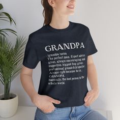 Honor Grandpa or your Father-in-law by defining him with this classic unisex jersey short sleeve tee that fits like a well-loved favorite. Super buttery soft cotton and a comfortable roomy fit make users fall in love with it over and over again. These t-shirts have-ribbed knit collars to bolster shaping. The shoulders have taping for better fit over time. Dual side seams hold the garment's shape for longer. For personalization: Write Grandpa name in the personalization box. (You can choose Gramp Casual Short Sleeve Tops For Father's Day, Father's Day Graphic Print Short Sleeve Tops, Funny Text Short Sleeve Tops For Father's Day, Father's Day Funny Text Short Sleeve Top, Father's Day Short Sleeve Shirt With Name Print, Relaxed Fit T-shirt With Name Print, Father's Day Text Print Short Sleeve Shirt, Relaxed Fit T-shirt With Name Print And Short Sleeve, Poppy Shirts Grandpa