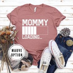 a t - shirt with the words mommy loading on it