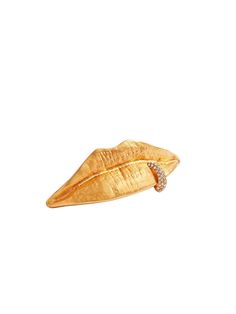 a gold ring with two leaves on top and diamonds in the middle, against a white background