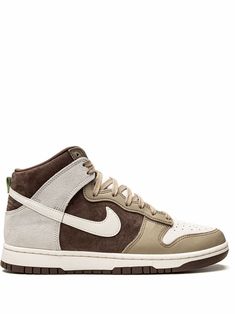 Brown/beige leather Dunk High “Light Chocolate" sneakers from NIKE featuring signature Swoosh logo detail, contrasting panel detail, round toe, front lace-up fastening, logo patch at the tongue, ankle-length, branded insole and rubber sole. These styles are supplied by a premium sneaker marketplace. Stocking only the most sought-after footwear, they source and curate some of the most hard to find sneakers from around the world.. | Nike Dunk High “Light Chocolate" sneakers Brown Nikes, Chocolate Sneakers, Nike Dunks High, Nike Brown, High Heel Sneakers, Nike Dunk High