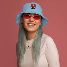 Make a stylish and eco-friendly choice with the organic bucket hat! This 100% cotton twill hat has the potential to become a favorite in your wardrobe thanks to its breathable material and clean look. Beetlejuice, Be Kind To Yourself, Slate Blue, Hat Making, Haiti, Trucker Cap, Ghana, Cotton Twill, Caps Hats