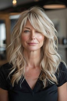 27. Soft Waves with Long Bangs - Medium-Length Hairstyles For Women Over 40 - Medium-Length Hairstyles For Women Over 40 Hairstyles For Medium Length Hair With Long Bangs, Medium Length Straight Hairstyles With Bangs, Med Length Hair With Side Bangs, Jenny Garth Hairstyles, Long Layered Hair With Side Bangs Over 40, 40 Year Old Hairstyles Long Hair With Bangs, Long Hair 40's Over 40, Long Bangs Blonde Hair, Hairstyles Waves Medium