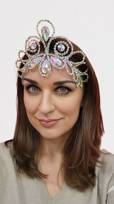 "Elegant rhinestones crown \"Loretta\". This mermaid headpiece will be perfect for your show dance, carnival, burlesque, samba dance, Caribana festival, Mardi gras festival, fusion bellydance, Brazilian carnival and will serve as a bright photoshoot accessory. Crown made of stainless spring steel with zinc coating. Such wire does not rust and is not subject to corrosion. Worldwide shipping ✈ Standard delivery 14-35 days UPS shipping to USA, delivery time 7-10 days If you want delivery as soon as possible, you can order expedite shipping by USPS EXPRESS SHIPPING for an additional fee (only for USA): https://www.etsy.com/AmaliaDesignStudio/listing/1139669654/express-shipping-by-ups-for-usa-expedite  I will be very happy if you visit AmaliaDesign boutique and follow it on social networks: htt Bright Photoshoot, Dance Hair Piece, Ballroom Dance Hair, Mermaid Headpiece, Dancer Legs, Dancer Necklace, Mardi Gras Festival, Brazilian Carnival, Samba Dance