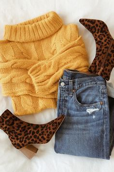 The Lulus Alden Mustard Yellow Cropped Balloon Sleeve Knit Sweater is giving us the ultimate cozy-chic vibe! Trendy balloon sleeves add statement-making detail to this cable knit sweater with a rounded neckline and wide-cut cropped bodice. Ribbed knit accents the sleeve cuffs neck and hem. Wear with light wash jeans and dad sneaks for a street-style inspired look or dress up with a mini skirt and thigh-high boots! #LoveLulus Yellow Sweater Outfit, Skirt And Thigh Highs, Cozy Dress Outfit, Trendy Balloons, Mustard Sweater, Pullover Outfit, Braut Make-up, Cropped Knit Sweater