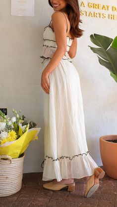 Embrace timeless charm with the Cream Ruffled Sheer Two – Piece Set Maxi Dress. Highlighted by elegant ruffled layers and contrasting black stitching, this dress exudes sophistication. Perfect for both casual outings and special occasions. Chic Tiered Maxi Dress With Lace Trim, Summer Maxi Dress With Lace Trim And Tiered Skirt, Elegant Ruffle Dress For Vacation, Elegant Ruffle Dress With Ruffled Skirt For Vacation, Chic Spring Ruffle Dress With Lace Trim, Bohemian Ruffled Dress For Date Night, Bohemian Dress With Ruffles For Date Night, Chic Dresses With Lace Trim And Flowy Skirt, Chic Dresses With Lace Trim And Tiered Skirt