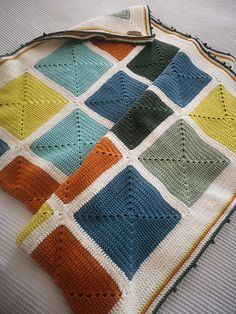 a crocheted blanket that has been made to look like a granny's square