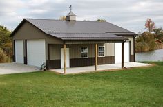 a metal building with garage attached to it