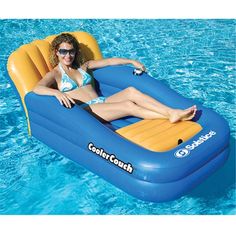 a woman sitting on an inflatable pool float