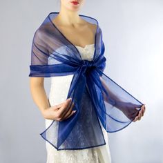 A very elegant organza shawl for your wedding party or evening dress. Made of luxury organza, slightly sparkles on the sun or light. Color: royal blue ( other colors are available ) Size : 200 cm x 45 cm You can use it as a wrap, shawl or stola. WE have matching bags in our Etsy Shop! WE accept credit cards! Elegant Blue Shawl For Spring, Elegant Sheer Organza Veil, Elegant Organza Shawl For Evening, Elegant Sheer Veil For Evening, Elegant Blue Summer Shawl, Elegant Blue Shawl For Summer, Elegant Summer Blue Shawl, Elegant Summer Wrap, Elegant Summer Shawl Wrap