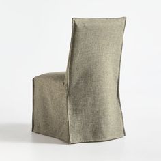 an upholstered chair that is made out of linen and has a square back