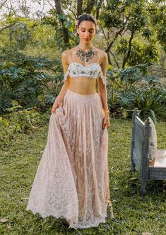 Crop - ivory raw silk bralette, hand embroidered checked trellis, asters, lilacs, freesias with light gold floss, shimmery beads and zardosi. Skirt - a french vintage rose lace embroidered with pearls, full vintage high - waist, pockets and under layers of silk, tulle and cancan. Pearl Skirt, Silk Bralette, Tassel Skirt, Silk Tulle, Rose Lace, Pearl And Lace, Indian Fashion Designers, Ivory Lace, Black Bow