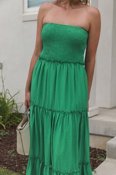 Introducing our Green Tube Top Maxi Dress - made for comfort and style. This dress features a smocked bodice for the perfect fit, along with a tiered skirt for a flowy and flattering look. Perfect for the summer. smocked bodice strapless tiered maxi length lined true to size model is wearing a medium in the picture Green Tiered Dress, Curvy Date Night Outfit, Tube Top Maxi Dress, Air Clothes, Green Tube Top, Smocked Maxi Dress, Green Maxi Dress, Valentines Day Dresses, Tube Top Dress