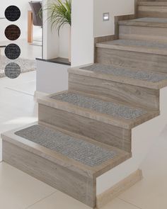 a set of stairs with carpeted steps leading up to the second floor in a modern home