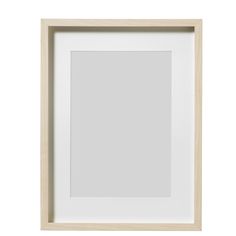 a white frame with a light wood border on the bottom and an empty area below it